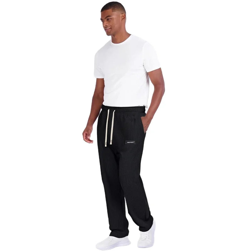 2026 spring autumn Men Casual Loose Drawstring Pants Fashion Sweatpants solid-color Corduroy trousers jogger training men Pants